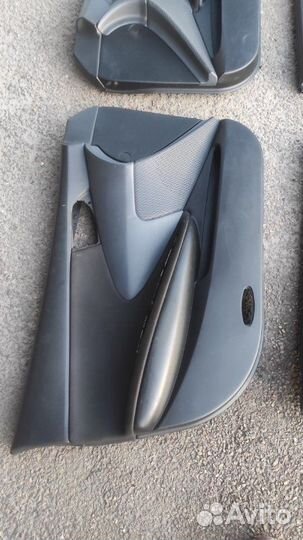 Обшивка боковой двери Nissan Primera P 12