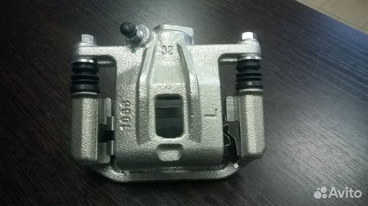 Суппорт задний правый в сборе