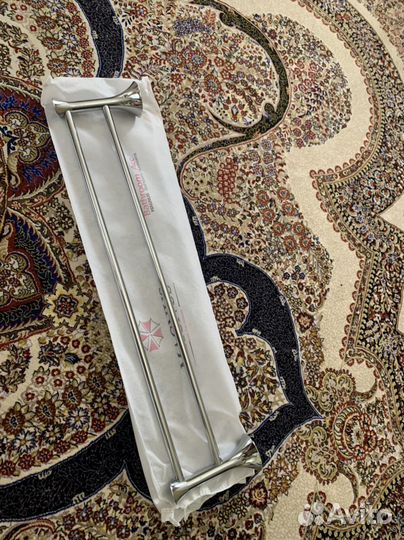 Вешалка для полотенец в ванной