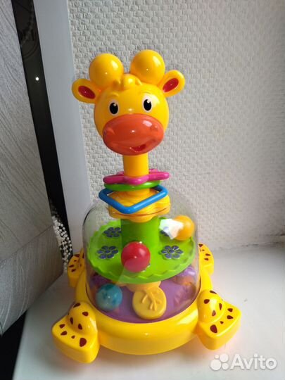 Развивающая игрушка юла-жираф