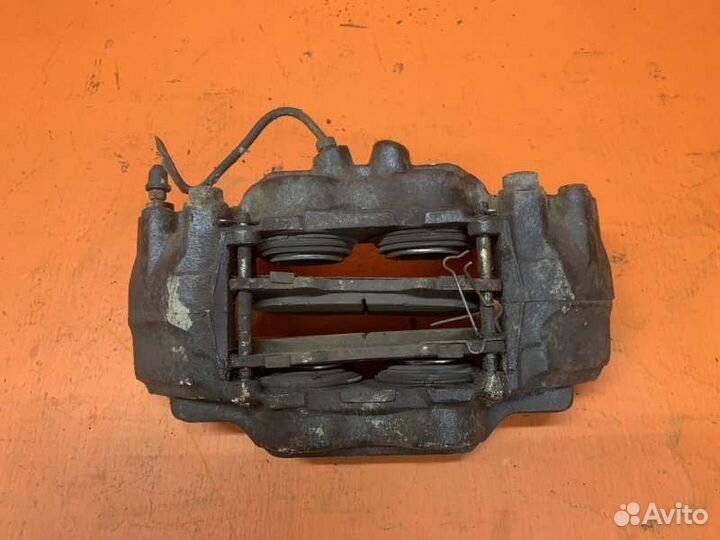 Суппорт тормозной передний левый Toyota Fj Cruiser