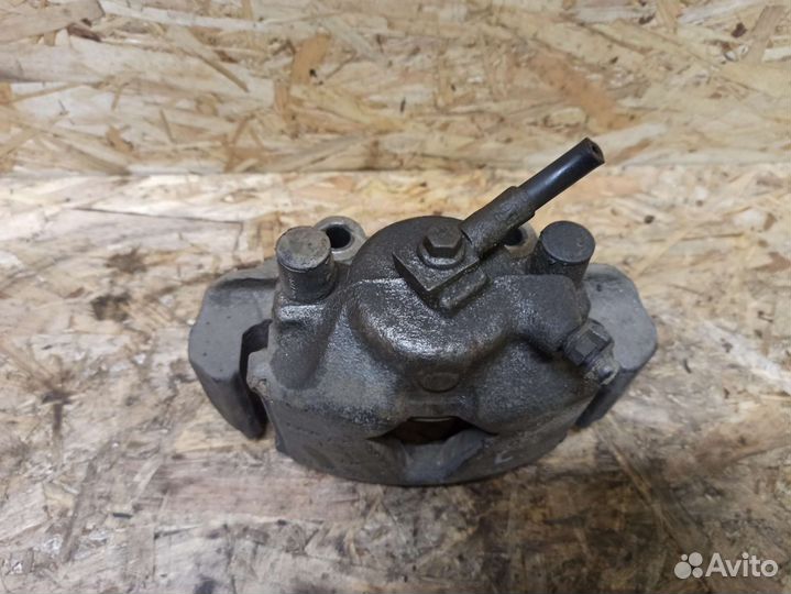 Суппорт передний левый Opel Astra F