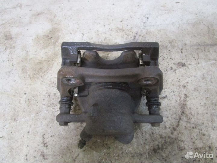 Суппорт тормозной передний правый Renault Duster 2012 (7701208333)