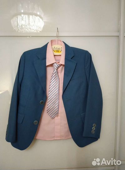 Костюм детский новый 122 см