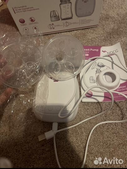 Молокоотсос электрический новый