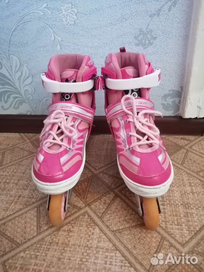 Роликовые коньки