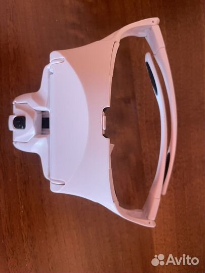 Налобная лупа