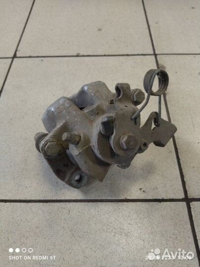 Суппорт тормозной задний правый Peugeot 407