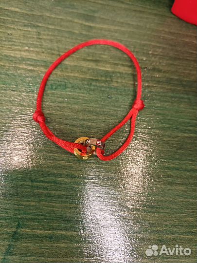Браслет cartier красная нить