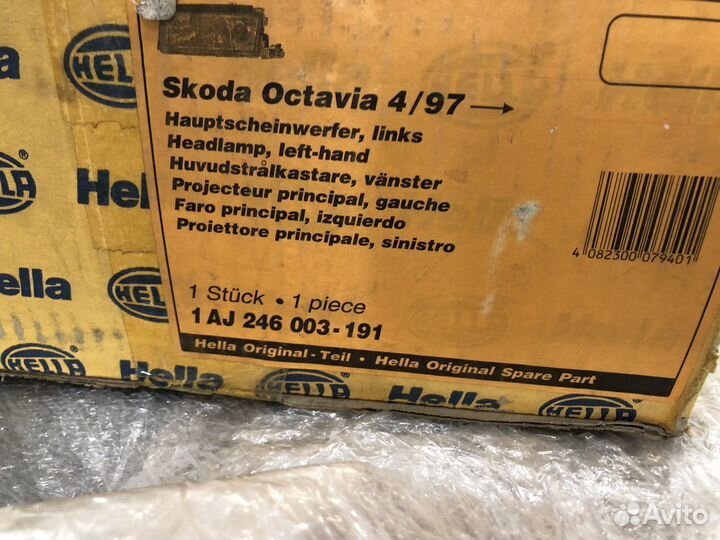 Фара левая hella Skoda Octavia 96-00