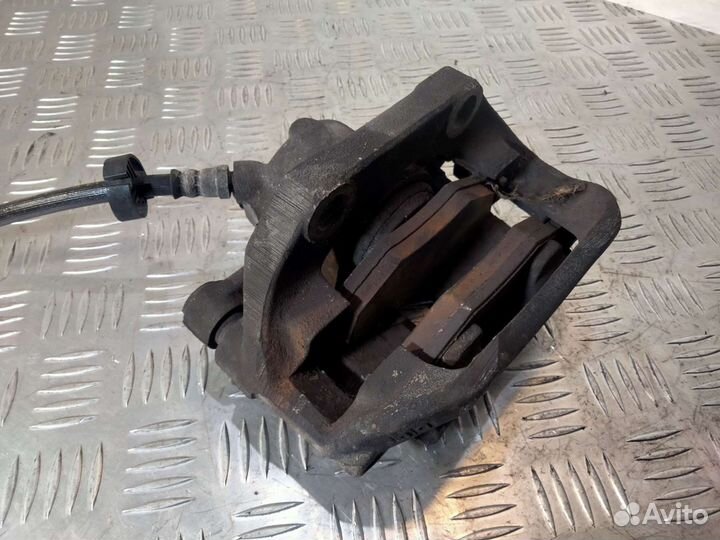 Суппорт передний левый Renault Kangoo