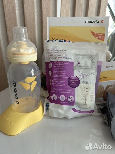 Молокоотсос medela электрический