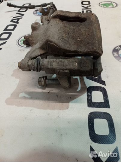 Суппорт передний левый Skoda Octavia