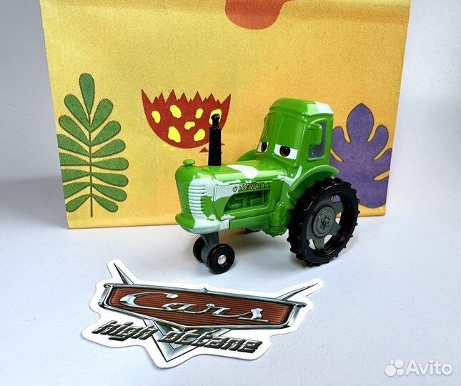 Зеленый трактор из мульта Тачки