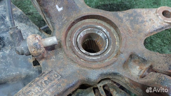 Кулак поворотный передний левый CX-7 2.3