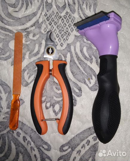 Когтерезка, пилка и триммер для кошек