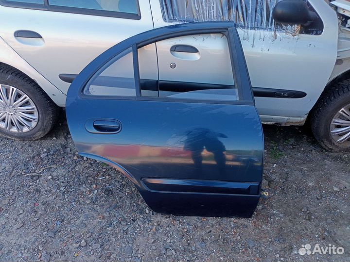 Задняя правая дверь на Nissan Almera Classic B10