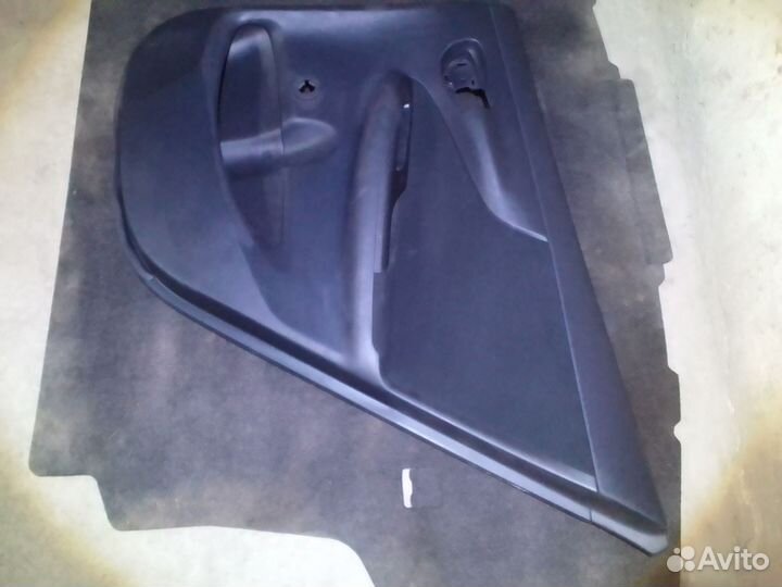 Обшивка задней правой двери Toyota Corolla E150
