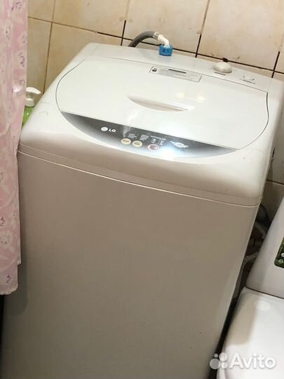 Стиральная машина с вертикальной загрузкой