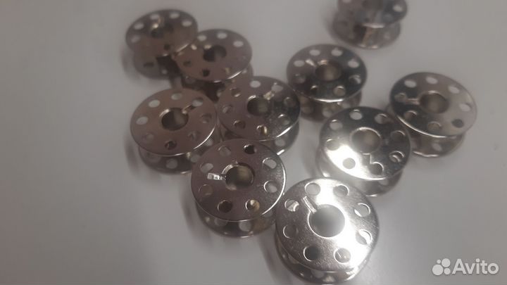 Шпульки на промышленную машину