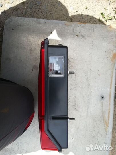 Левый задний фонарь universal 0099