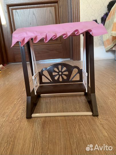 Игрушечная качель