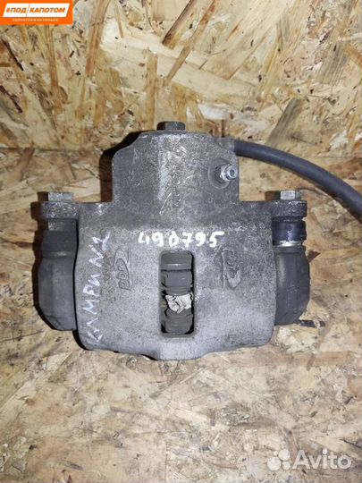 Суппорт тормозной задний правый Toyota Camry XV40