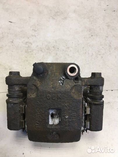 Суппорт тормозной задний левый SsangYong Kyron