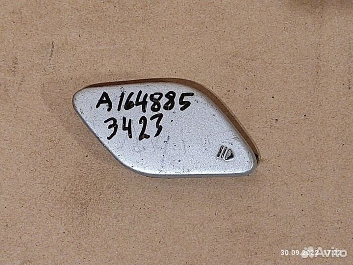 Заглушка буксировочного крюка передняя