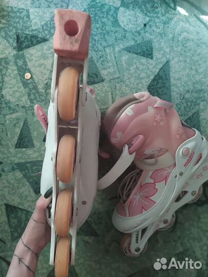 Роликовые коньки