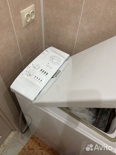 Стиральная машина с вертикальной загрузкой