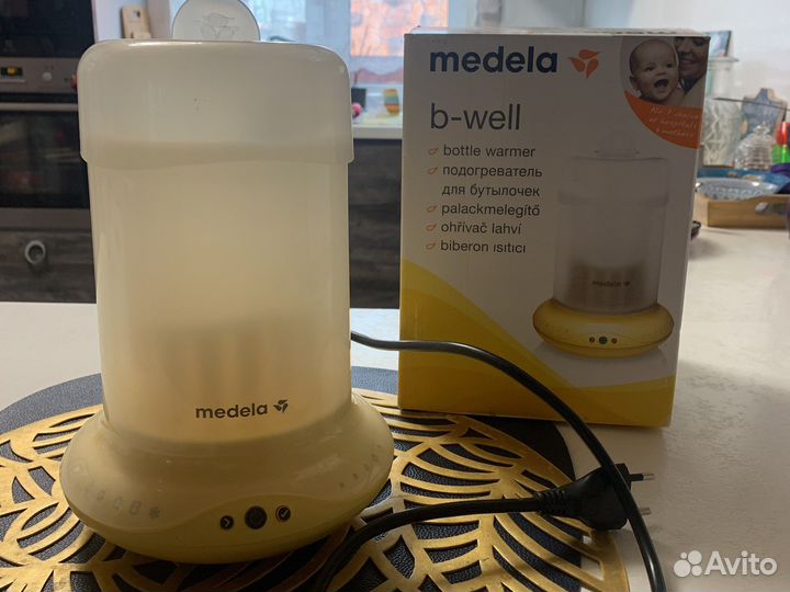 Подогреватель для бутылочек Медела