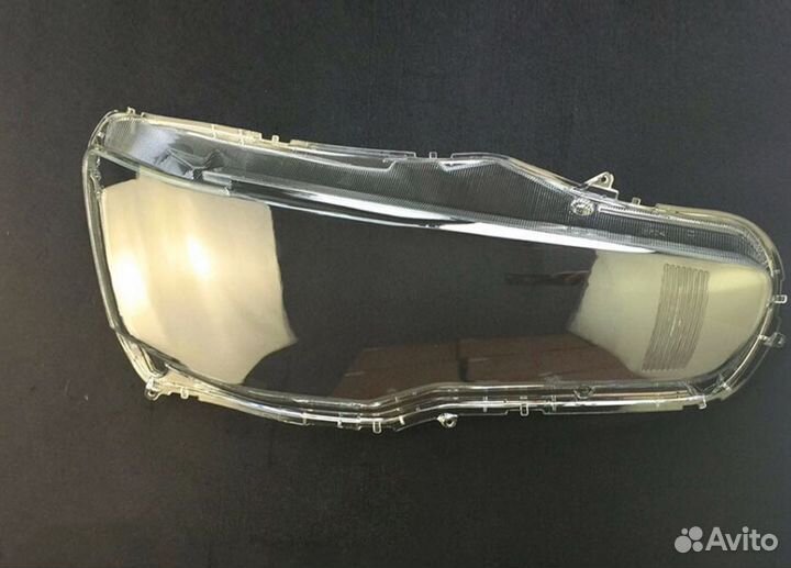Стекло фары Mitsubishi Lancer X