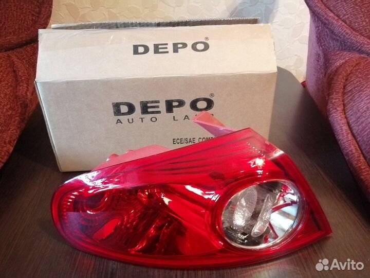 Фонарь левый новый на Шевроле Лачетти