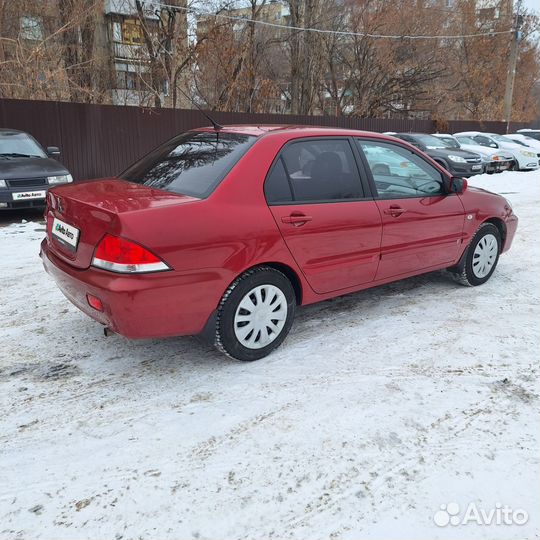 Mitsubishi Lancer 1.6 МТ, 2009, битый, 235 000 км