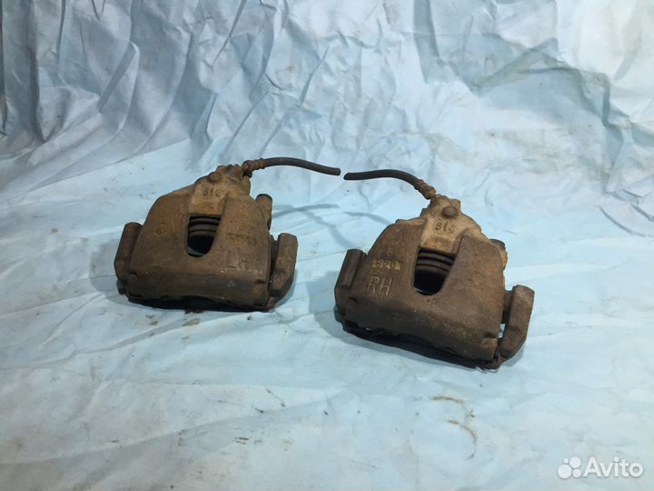 Суппорт передний правый левый Mazda 3 BL BK