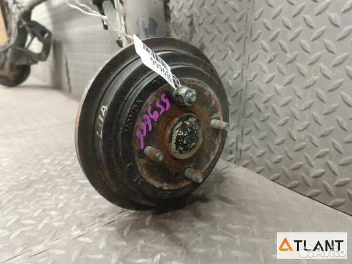 Балка со ступицами задний honda FIT