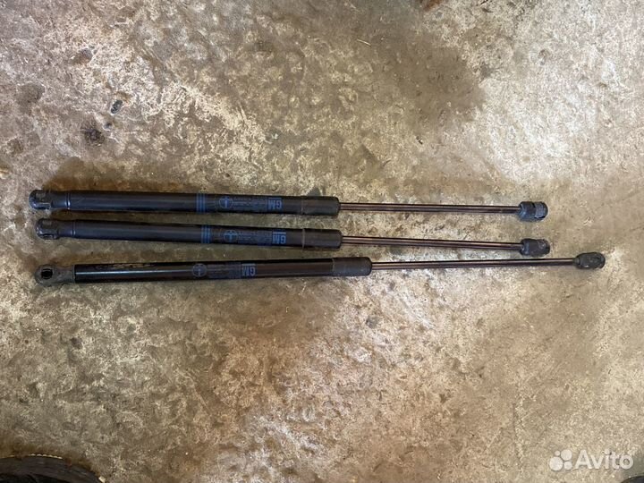 Амортизатор крышки багажника капота Opel Astra H