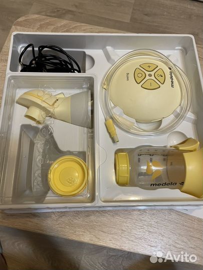 Молокоотсос электрический medela swing flex