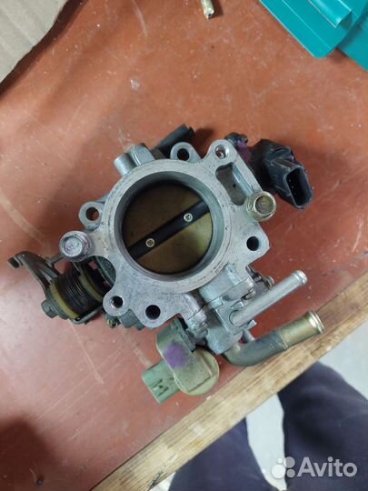 Дросельная заслонка селика st 205