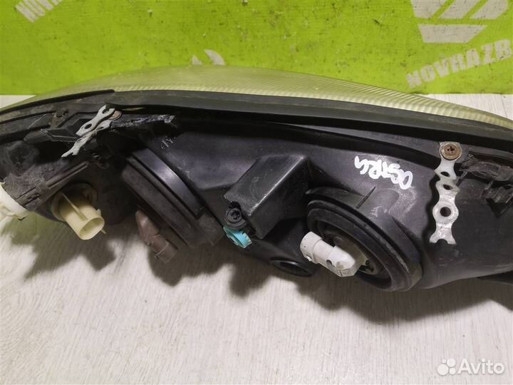 Фара левая Опель Астра Джи 98-05