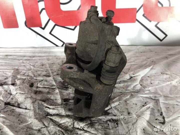 Суппорт тормозной передний правый Opel Astra J До