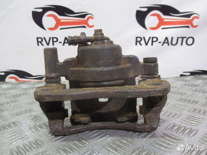 Суппорт тормозной передний Mazda 626 GF 1997-2002