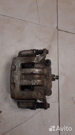 Суппорт передний левый