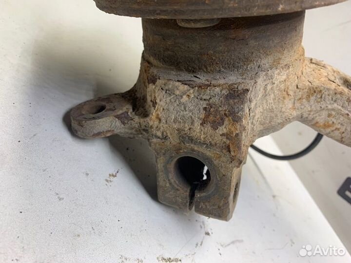 Кулак поворотный передний левый Mitsubishi Lancer