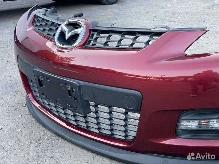Бампер передний Mazda CX-7 2006-2008 до рест