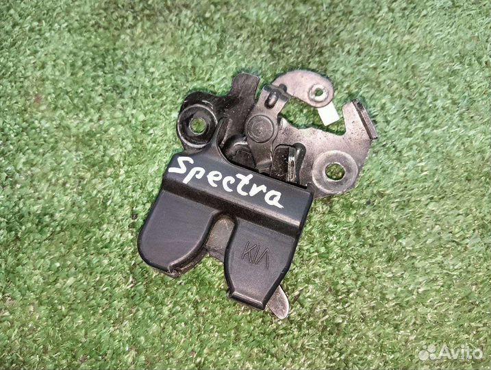 Замок крышки багажника Kia Spectra