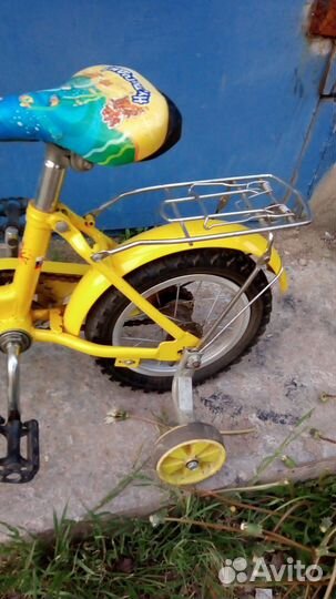 Детский четырёх колёсный велосипед