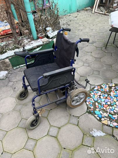 Коляска инвалидная на электротяге