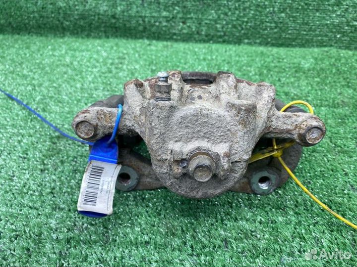 Тормозной суппорт передний левый Kia Rio 3